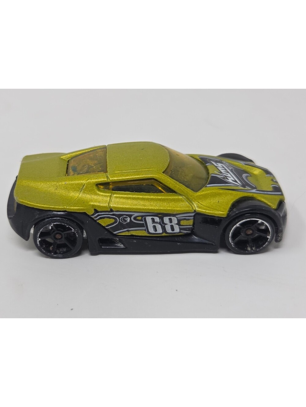 Hot Wheels Symbolic Metallic Green Number 68 Race Car Silver Line Diecast Toy